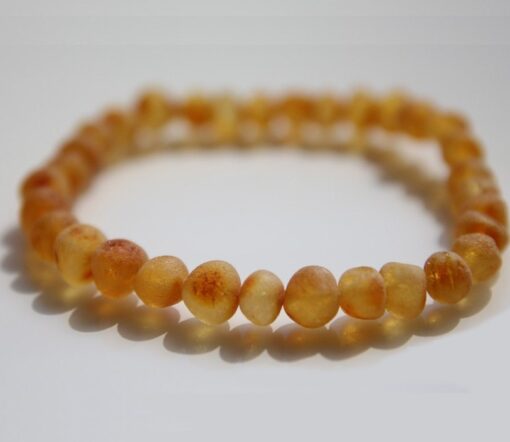 Felnőtt borostyán karkötő polírozatlan sötét méz szín